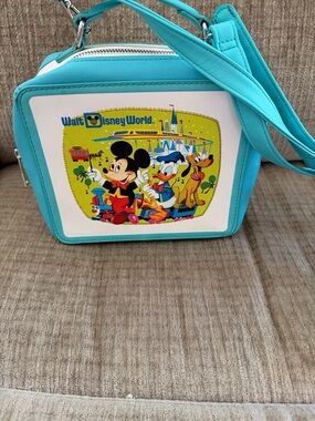 Disney’s lounge fly vault collection Crossbody APX 7 1/2 x 8 1/2
